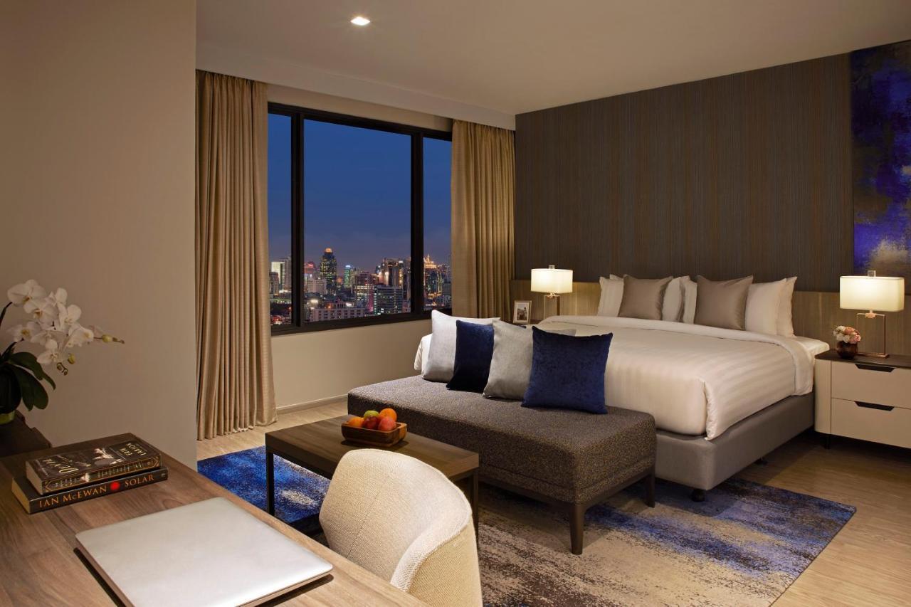 Somerset Rama 9 Bangkok Esterno foto A bedroom at the hotel